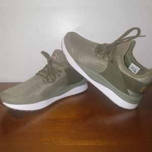 Women's size 10 Puma slip on soft foam Sneakers olive green and gold accents